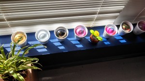 Paint-swirled glass balls drying in the sun